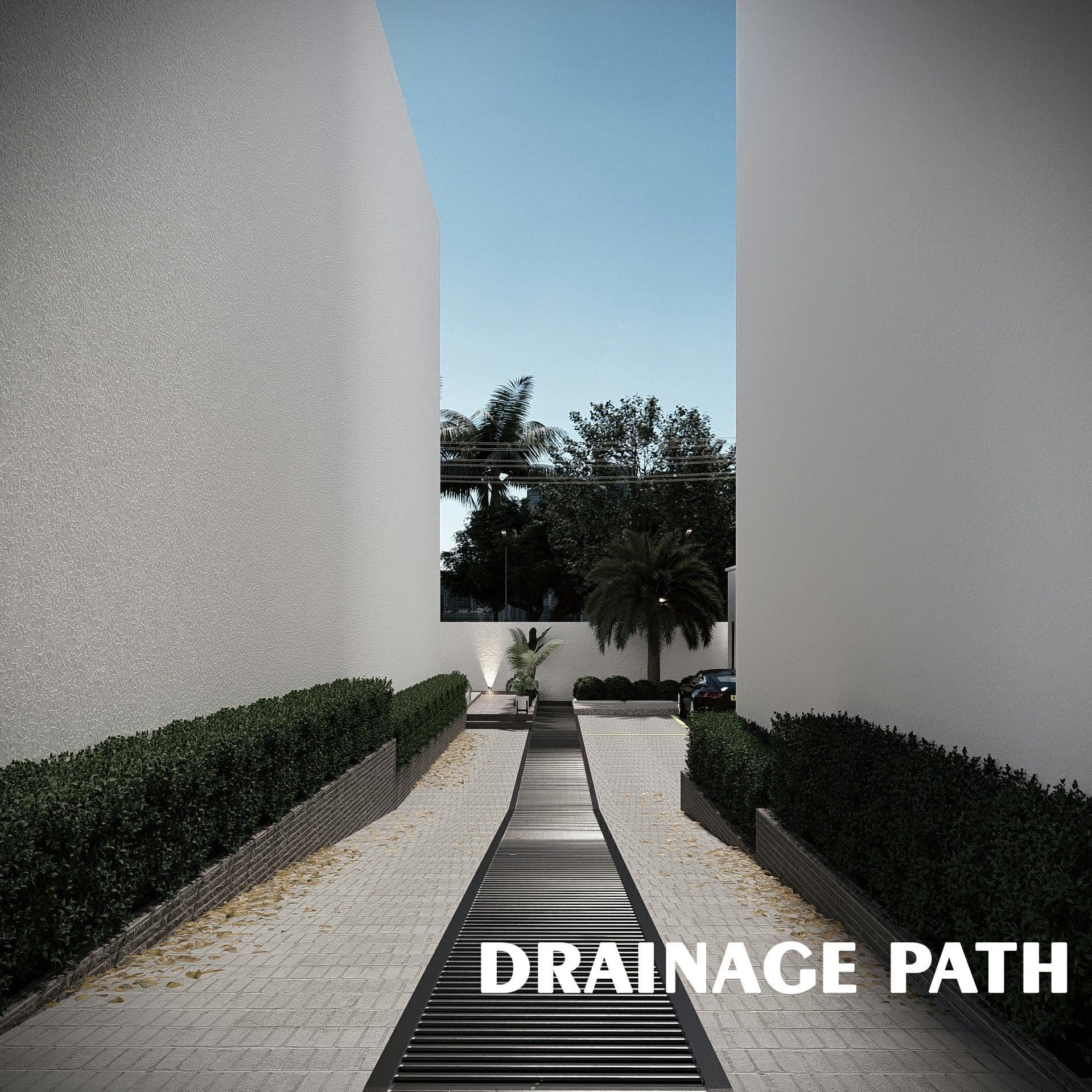 Paved path between two blocks at Ewang Estate with a full-length linear drainage grille running down its centre, bordered by clipped hedges in raised brick planters.